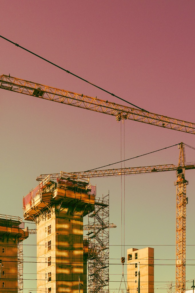 High-rise construction with tower cranes