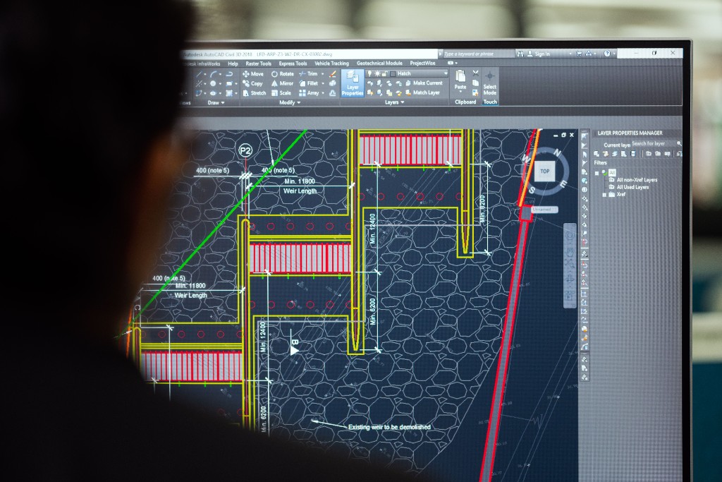 Engineer reviewing Civil 3D structural drawings