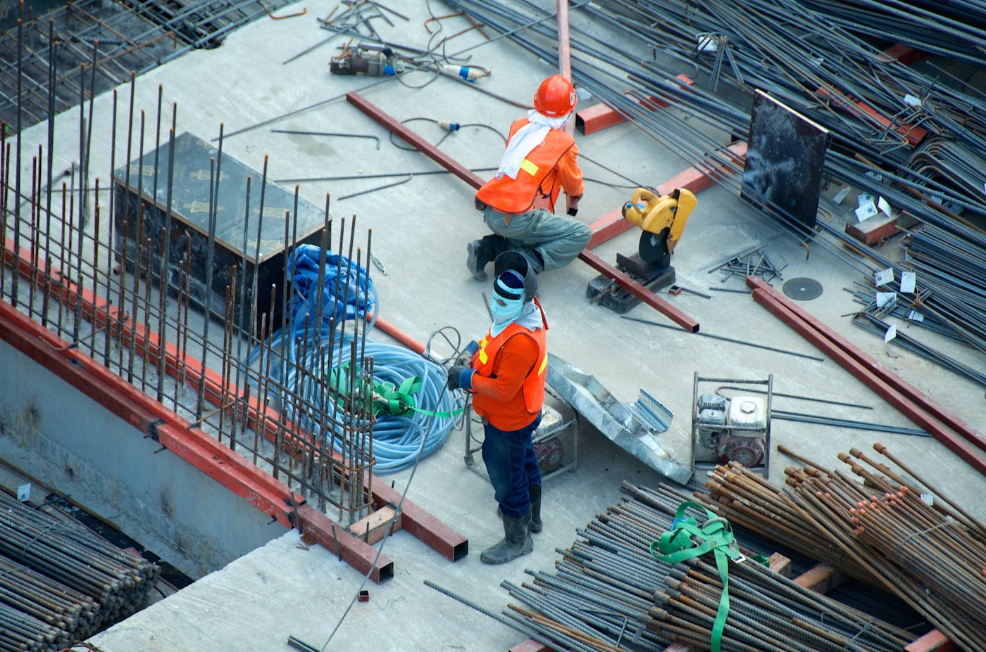 Engineers reviewing structural drawings on site